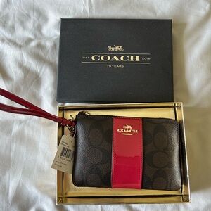 New-in-box Coach signature Wristlet